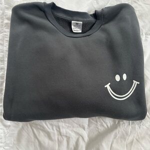 Grey Smiley Face Crewneck Sweatshirt – New, Never Worn- Size women’s medium